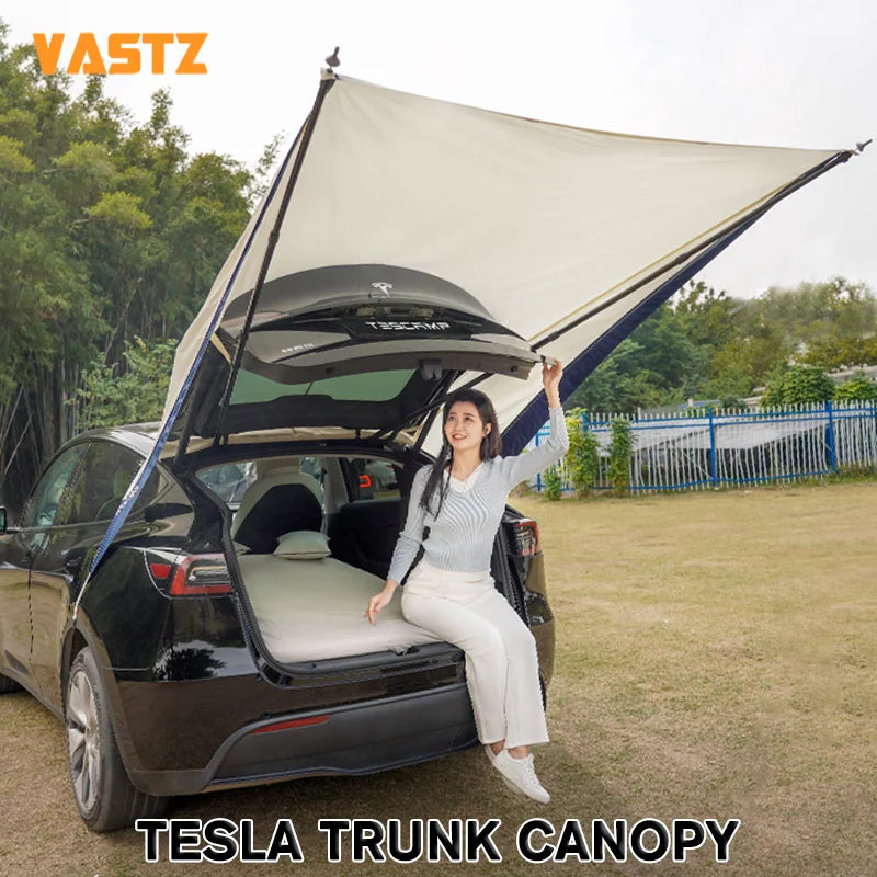 TeslaCamp™ – Dé Ultieme Draagbare Zon- en Regenluifel voor Je Tesla Model Y!