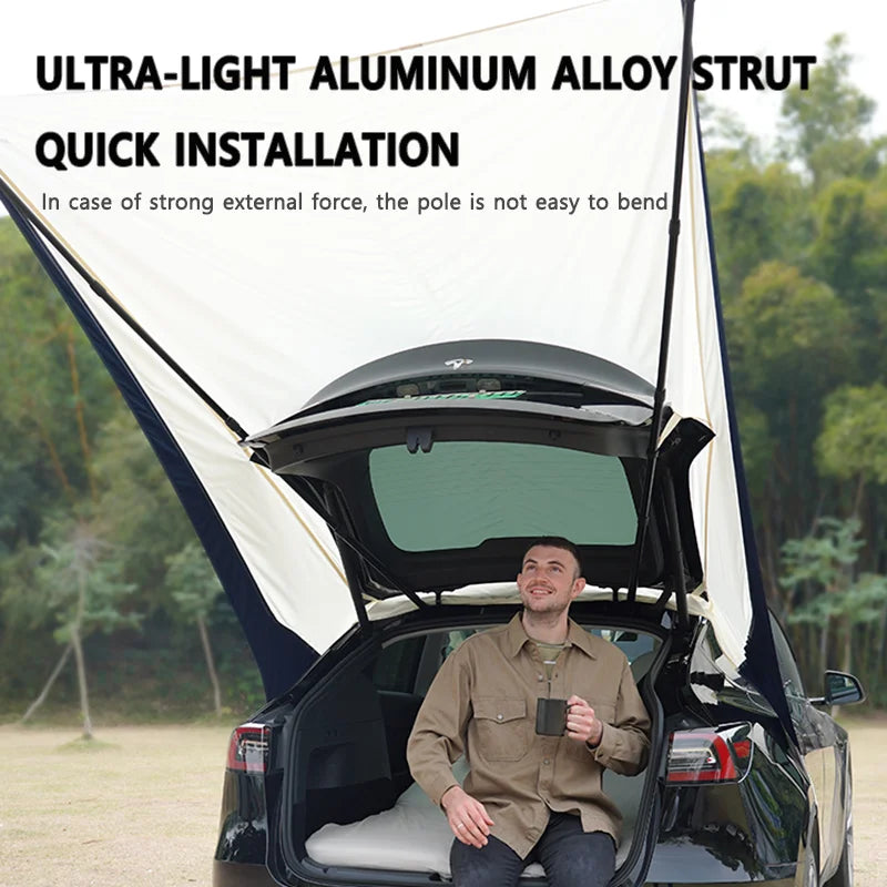 TeslaCamp™ – Dé Ultieme Draagbare Zon- en Regenluifel voor Je Tesla Model Y!